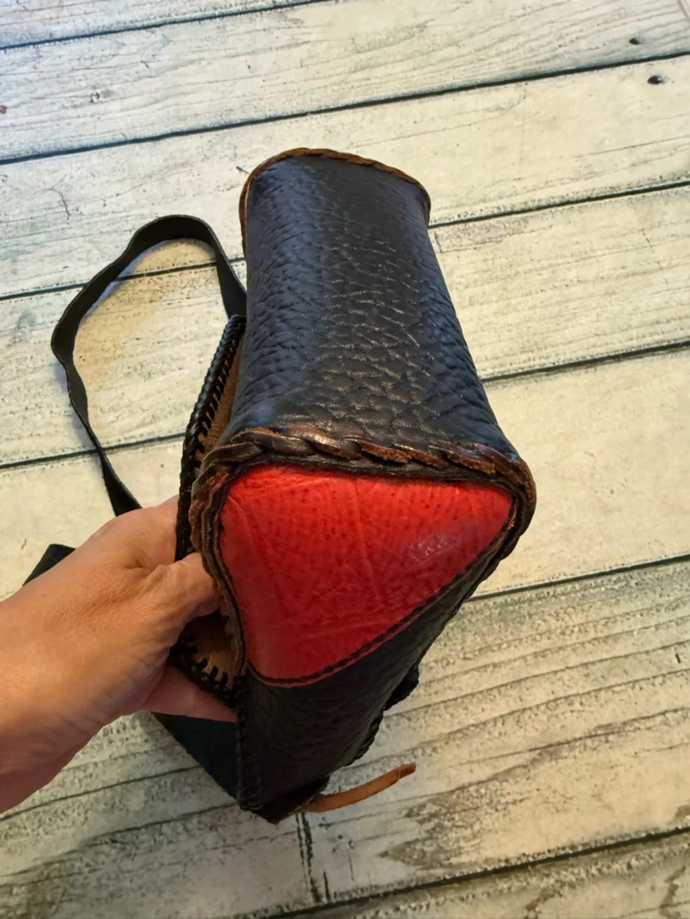 Vintage western leather black and red braided sides fringe shoulder bag purse.